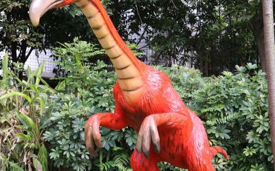 戶外草坪玻璃鋼卡通紅色恐龍雕塑