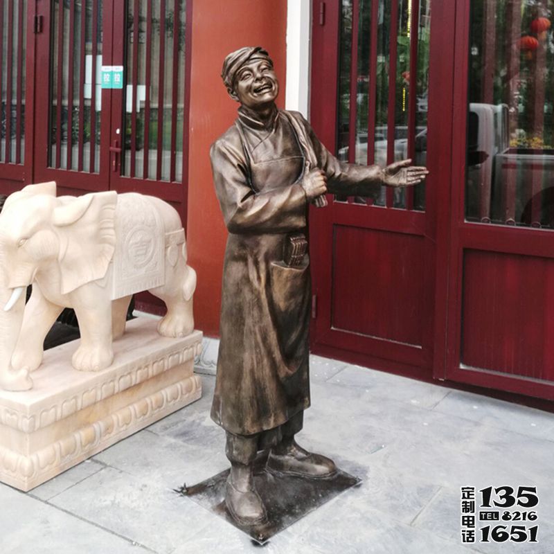 飯店門口仿銅小二迎賓玻璃鋼雕塑 飯店門口仿銅小二迎賓玻璃鋼雕塑